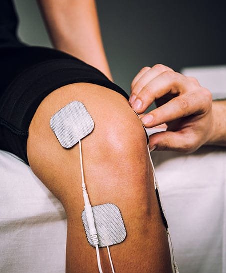 Electrotherapy session for frozen shoulder at PhysioRelieve Ghatkopar